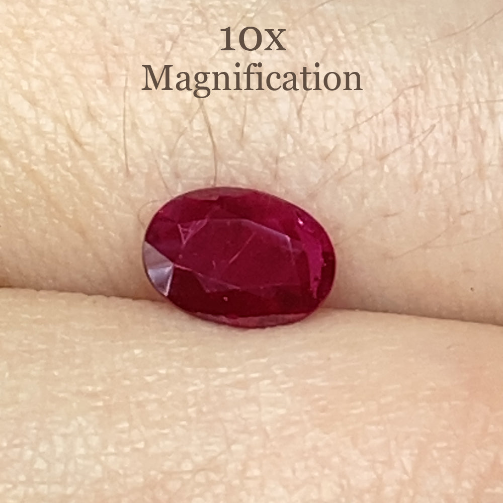 0.77ct Oval Red Ruby from Mozambique, precision-cut single stone by SkyJems, classic corundum gem with vibrant color and eleg