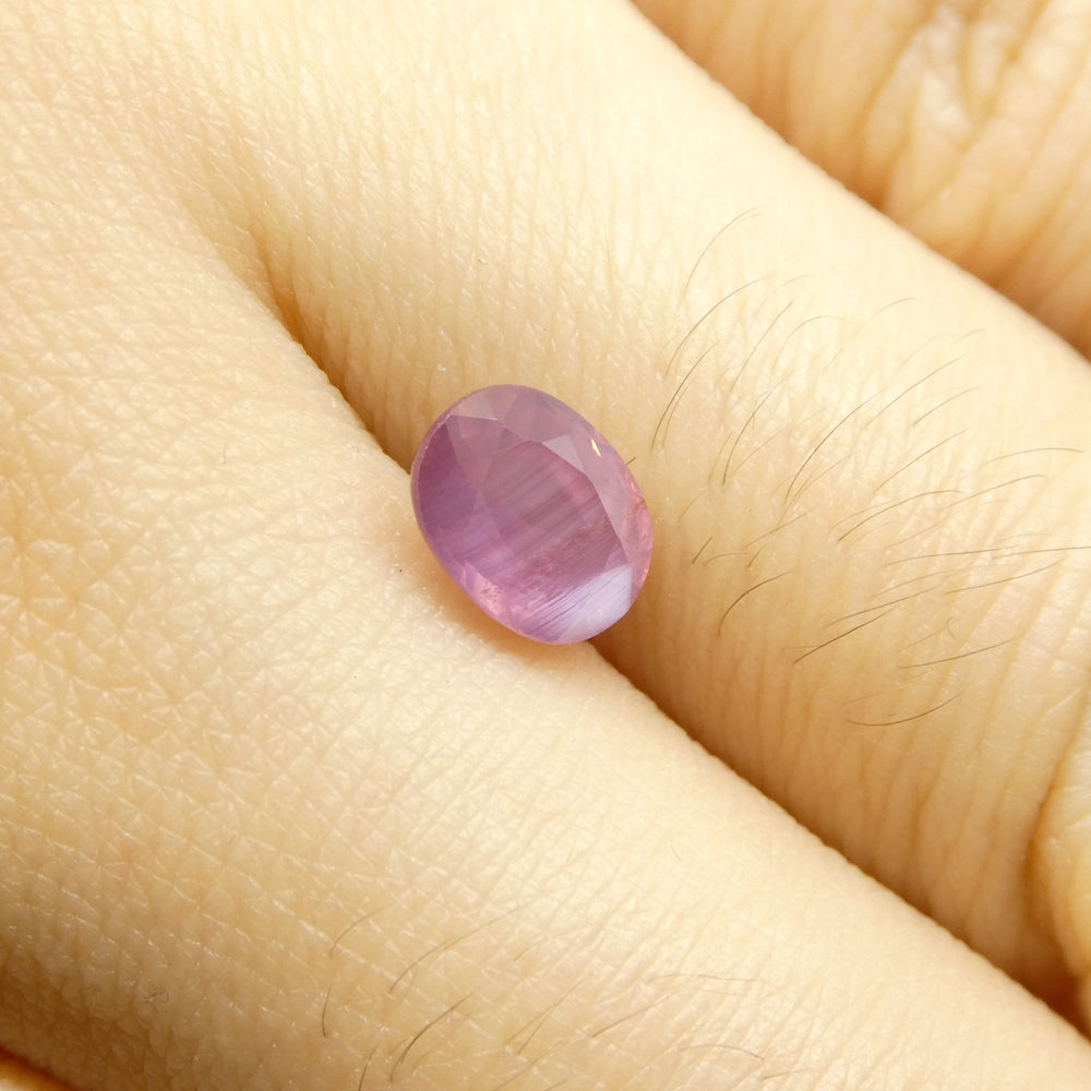 1.17ct Oval Opalescent Orangy Purplish Pink Sapphire from Umba, Tanzania - Skyjems Wholesale Gemstones