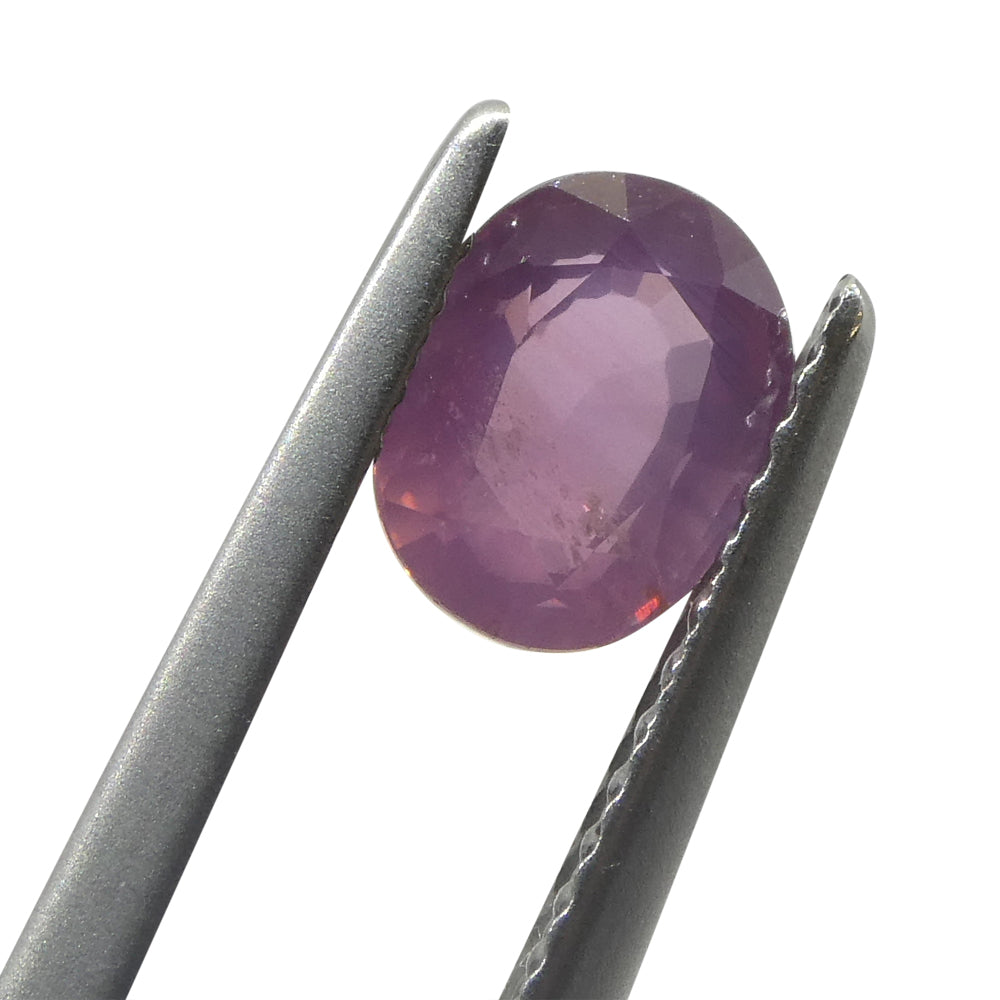 1.17ct Oval Opalescent Orangy Purplish Pink Sapphire from Umba, Tanzania - Skyjems Wholesale Gemstones