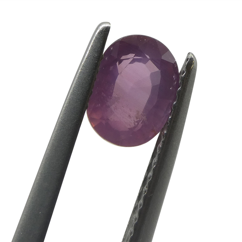 1.17ct Oval Opalescent Orangy Purplish Pink Sapphire from Umba, Tanzania - Skyjems Wholesale Gemstones