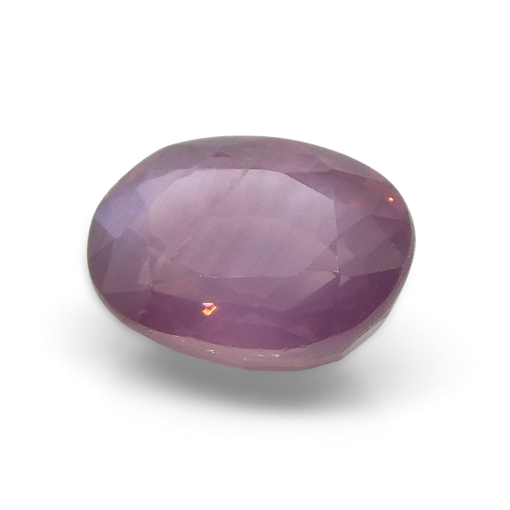 1.17ct Oval Opalescent Orangy Purplish Pink Sapphire from Umba, Tanzania - Skyjems Wholesale Gemstones