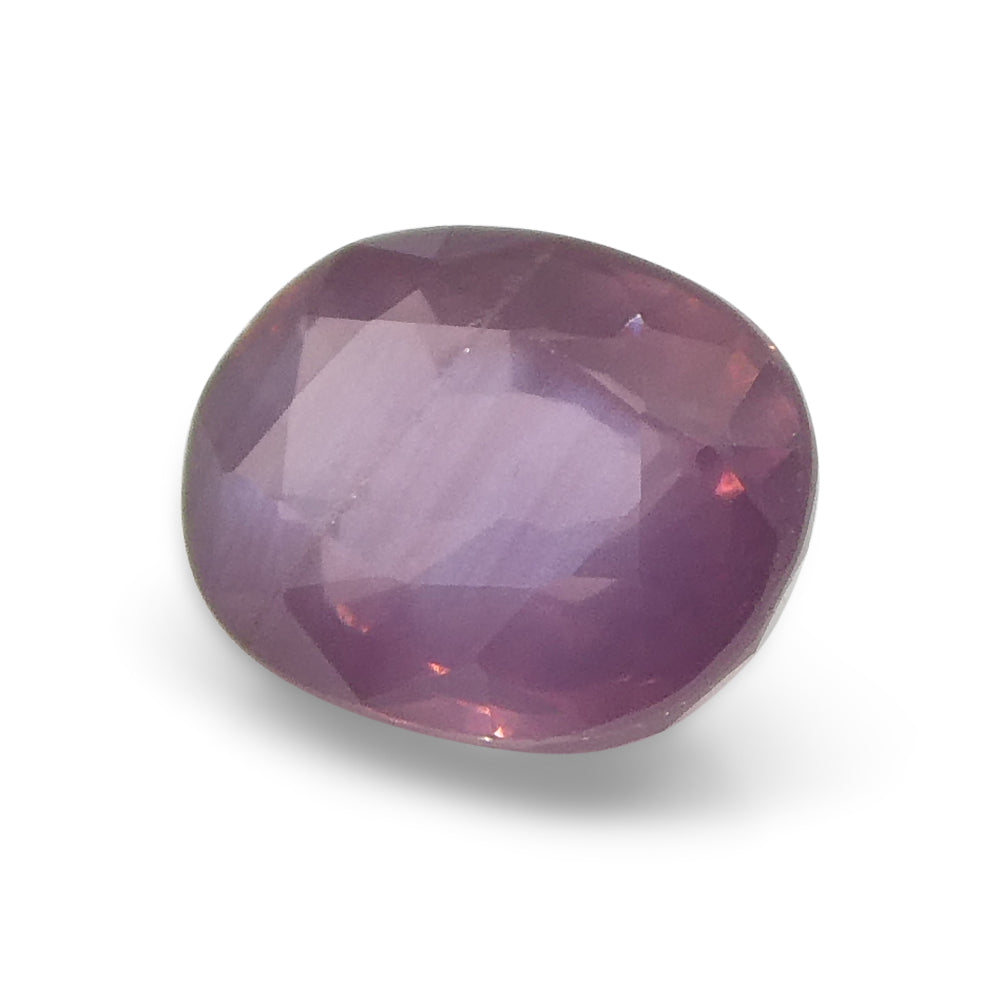 1.17ct Oval Opalescent Orangy Purplish Pink Sapphire from Umba, Tanzania - Skyjems Wholesale Gemstones