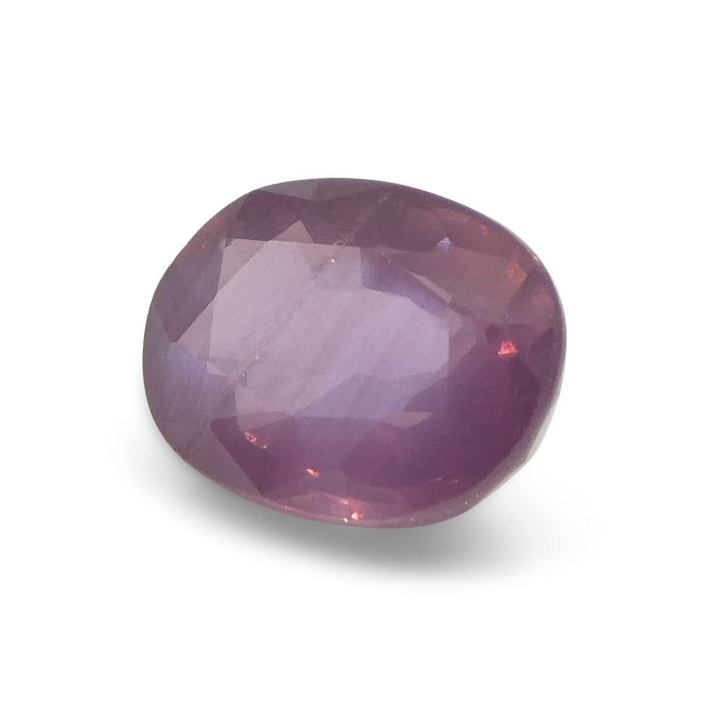 1.17ct Oval Opalescent Orangy Purplish Pink Sapphire from Umba, Tanzania - Skyjems Wholesale Gemstones