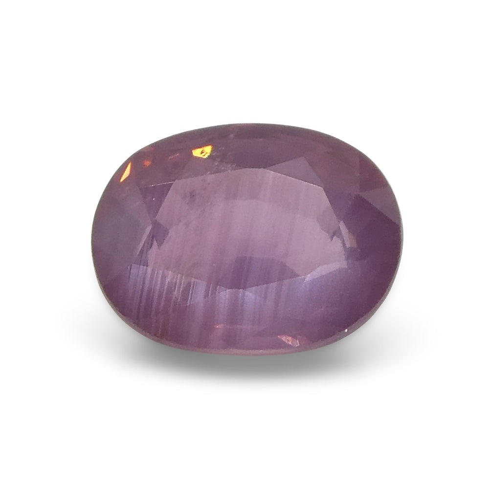 1.17ct Oval Opalescent Orangy Purplish Pink Sapphire from Umba, Tanzania - Skyjems Wholesale Gemstones