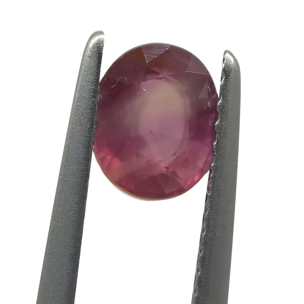 1.29ct Oval Opalescent Reddish-Pink Sapphire from Umba, Tanzania - Skyjems Wholesale Gemstones