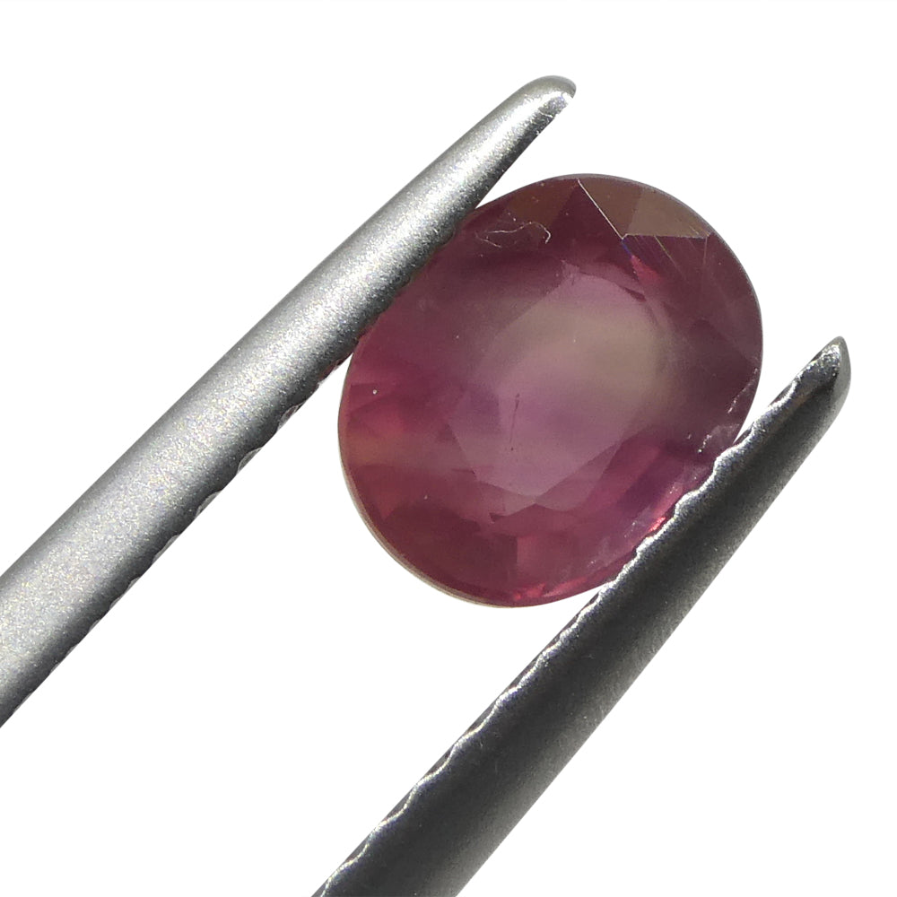 1.29ct Oval Opalescent Reddish-Pink Sapphire from Umba, Tanzania - Skyjems Wholesale Gemstones