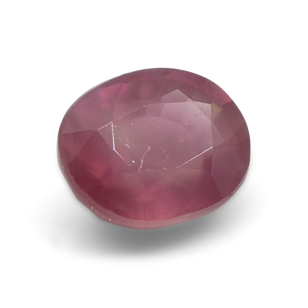 1.29ct Oval Opalescent Reddish-Pink Sapphire from Umba, Tanzania - Skyjems Wholesale Gemstones