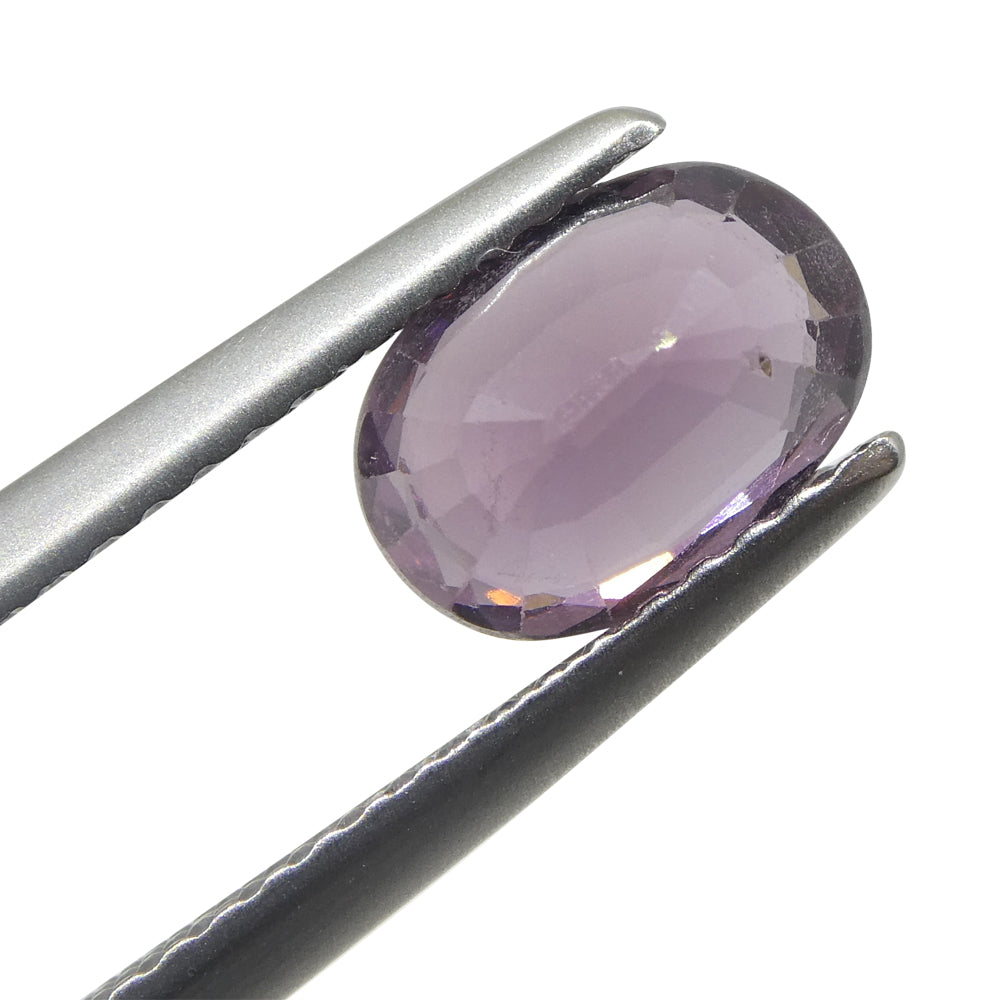 1.46ct Oval Purplish-Pink Sapphire from Umba, Tanzania - Skyjems Wholesale Gemstones