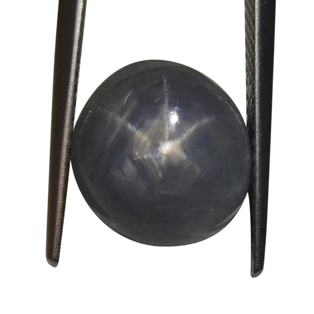 Blue-grey 6.86 ct Oval Star Sapphire from Sri Lanka, showcasing classic asterism effect, SkyJems premium gemstone collection