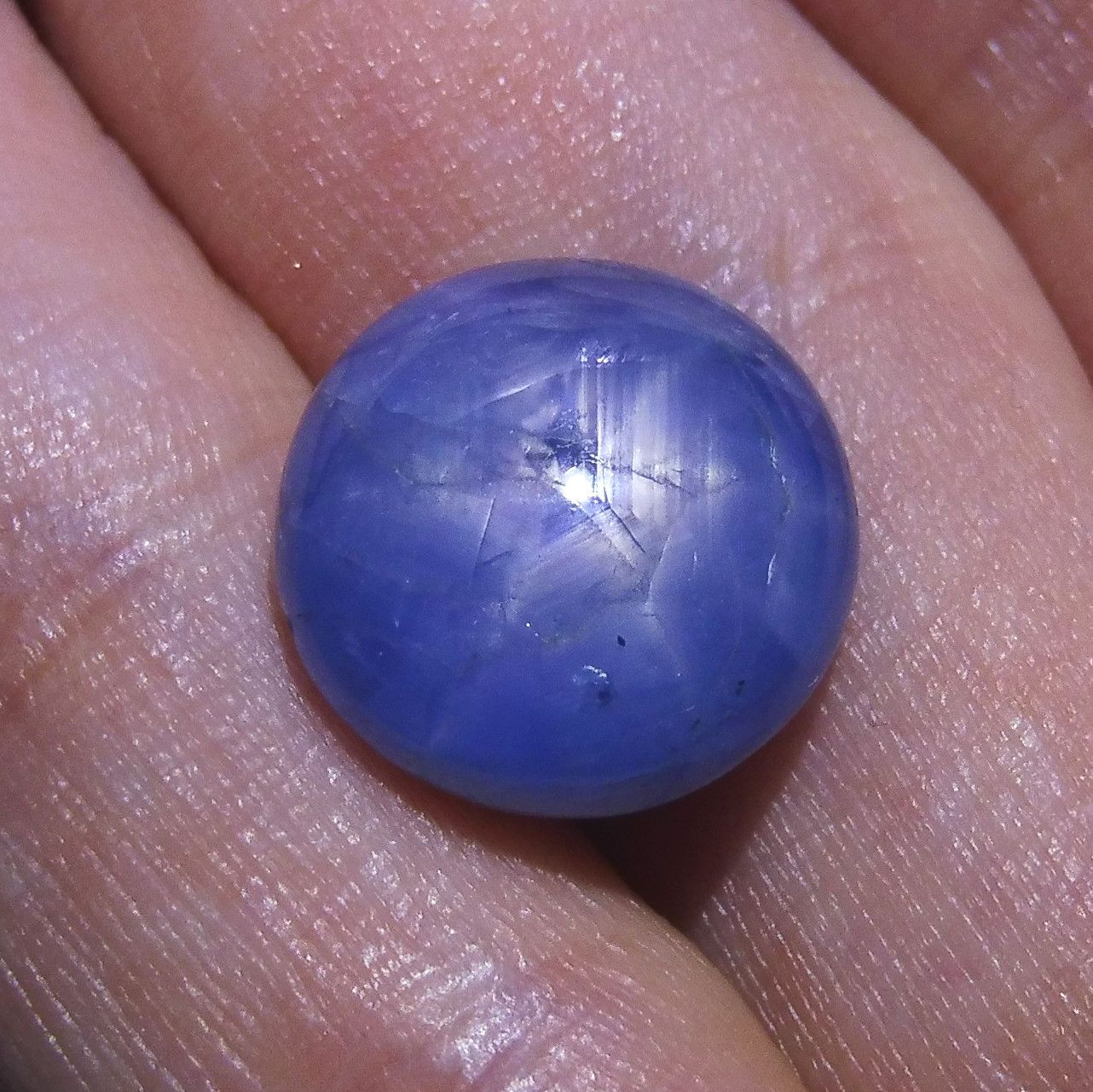 12.56 ct Round Burmese Star Sapphire, very slightly greyish blue, cabochon cut gemstone from SkyJems Canadian gem specialists