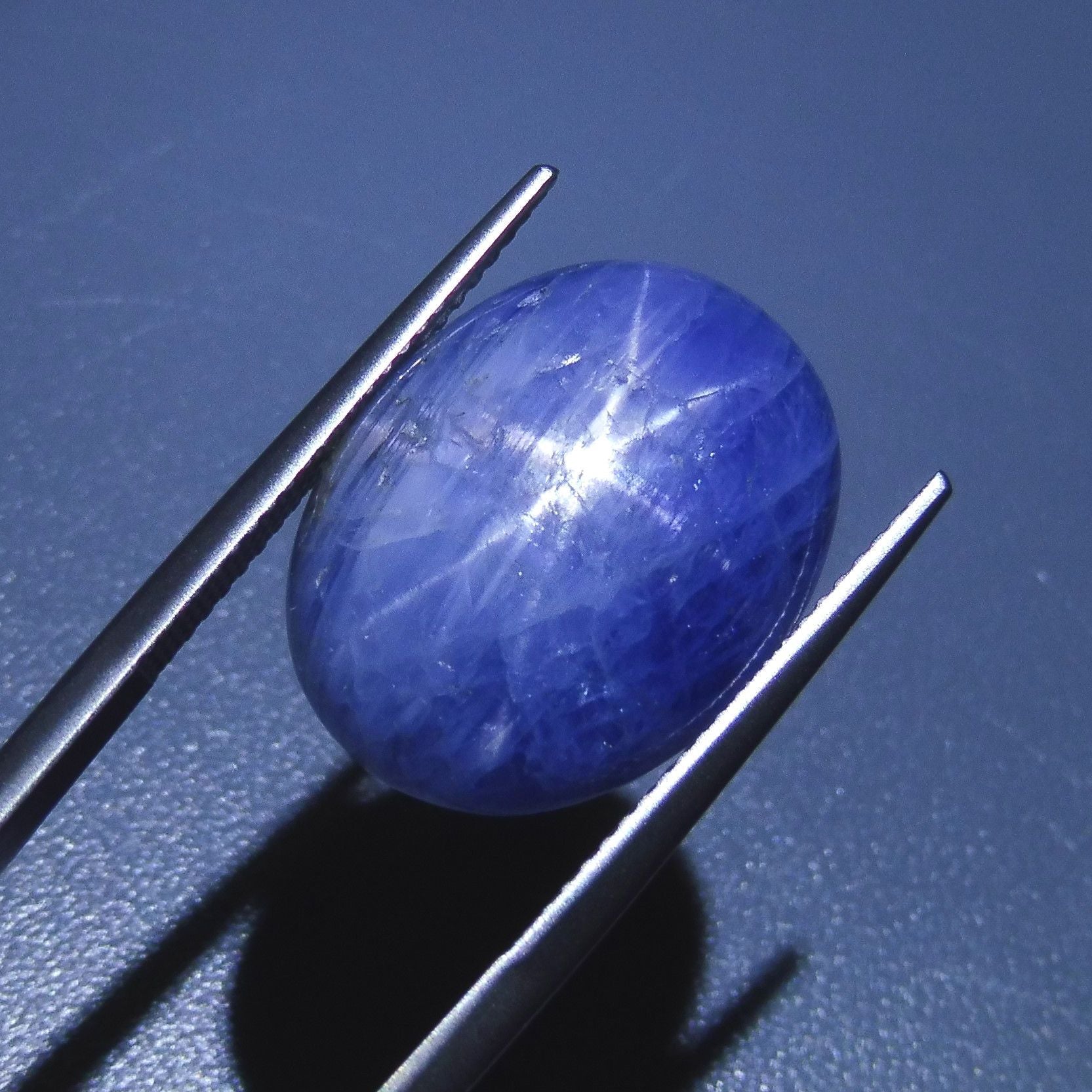 25 carat blue star sapphire from Myanmar, oval cabochon with asterism effect, premium gemstone by SkyJems Canadian gem specia