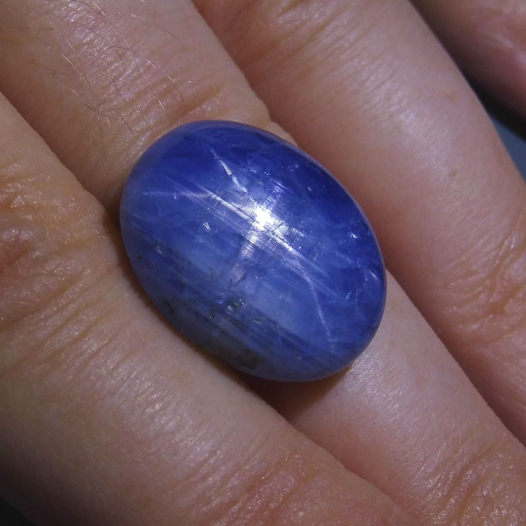 25 carat blue star sapphire from Myanmar, oval cabochon with asterism effect, premium gemstone by SkyJems Canadian gem specia