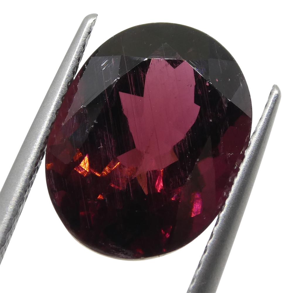 SkyJems 7.02ct Reddish Purple Oval Rubelite Tourmaline from Brazil, premium mixed-cut gemstone