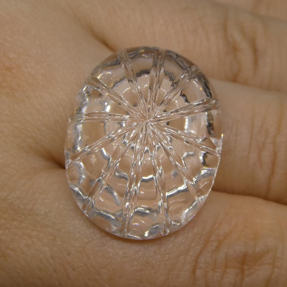 43.15 carat Brazilian white quartz oval fantasy cut gemstone from SkyJems, premium clear rock crystal with unique carved desi